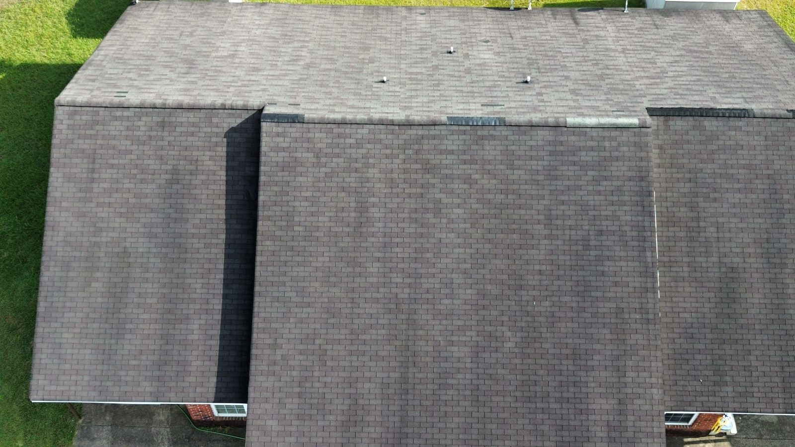 Before: worn 3-tab shingle roof - Empire K Roofing